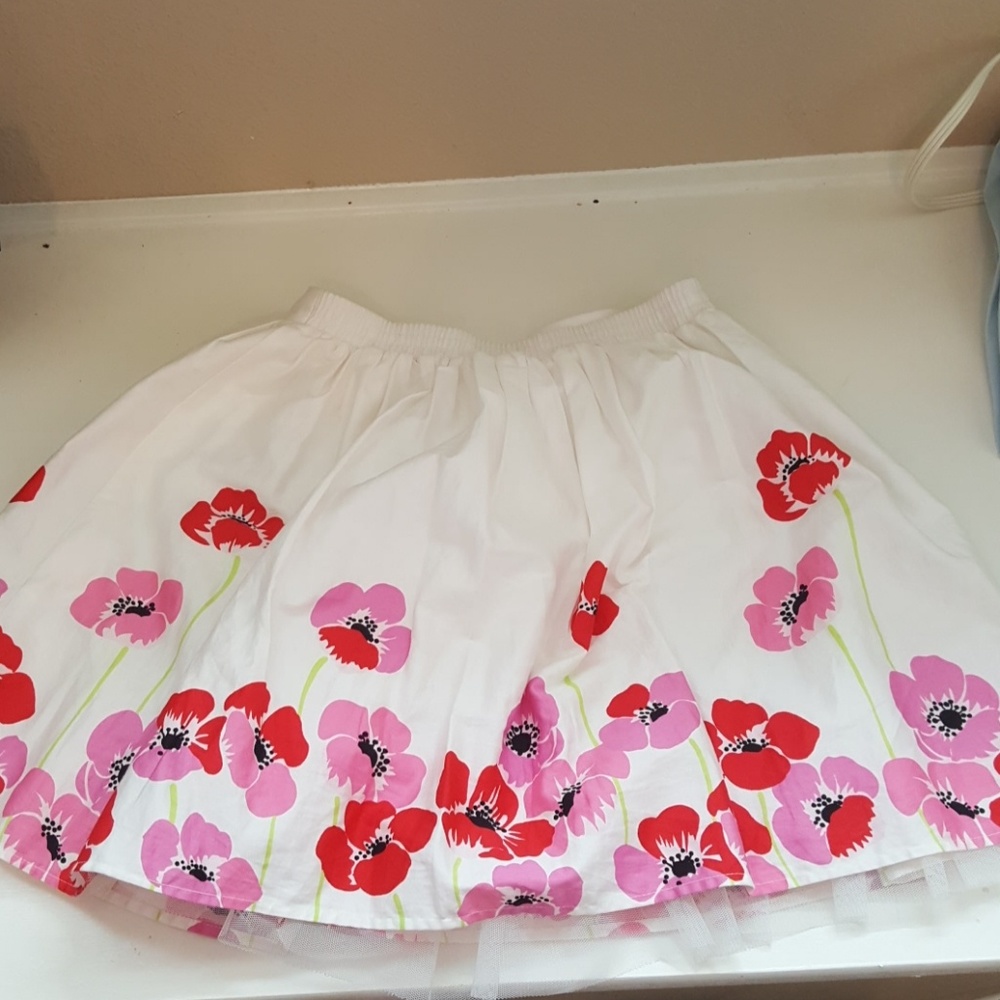 Knee length, slightly poofy skirt